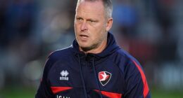 Cheltenham Town have sacked manager Michael Flynn after a dreadful start to the season