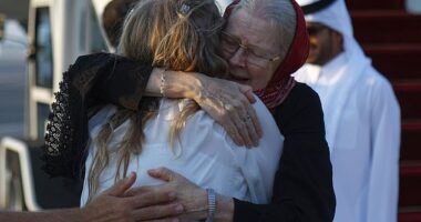 Barbie Reynolds hugs her daughter Sarah Entwistle after landing at the airport in Doha on September 19, 2025