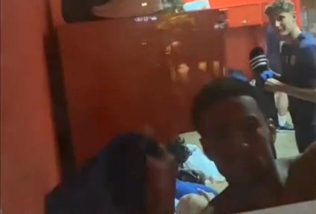 England Under-21 players attempted to block a fan from filming them in the changing room in Kazakhstan