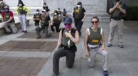 FBI Fires Agents Who Knelt for BLM Photo.