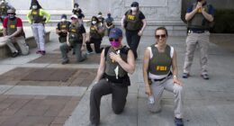 FBI Fires Agents Who Knelt for BLM Photo.