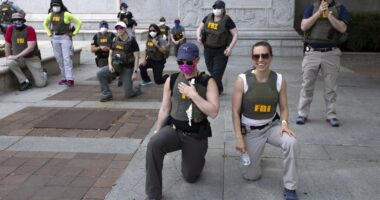 FBI Fires Agents Who Knelt for BLM Photo.