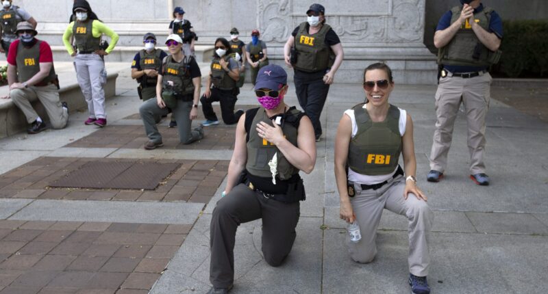 FBI Fires Agents Who Knelt for BLM Photo.
