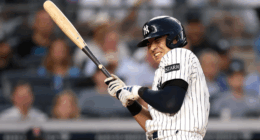 Michael Kay speaking passionately on-air, criticizing Yankees manager Aaron Boone for defending Anthony Volpe’s poor defense and inconsistent lineup decisions, calling for roster changes and more honesty with fans.