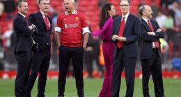 Fenway Sports Group, led by John W Henry (second right), have been eyeing an addition to their stable for some time