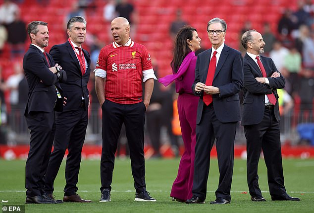 Fenway Sports Group, led by John W Henry (second right), have been eyeing an addition to their stable for some time