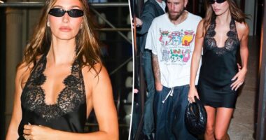 Hailey Bieber stuns in little black dress as she cozies up to Justin at 'SWAG II' release party
