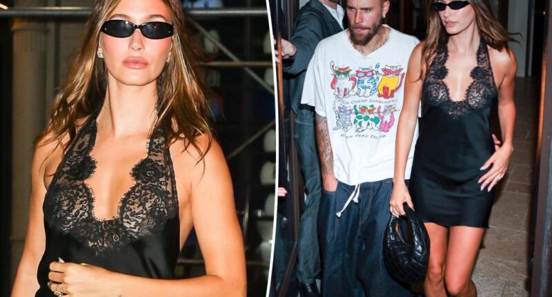 Hailey Bieber stuns in little black dress as she cozies up to Justin at 'SWAG II' release party