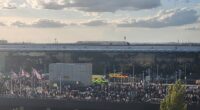 Crowds of people were seen gathering outside Terminal 4 as ambulances and fire crews rushed to the scene