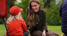 The Princess of Wales wore a dark green silk scarf she received as a gift from luxury fabric manufacturers Stephen Walters when she visited Sudbury Mill in Suffolk last week