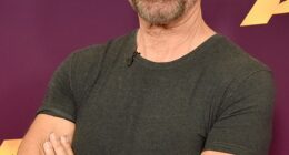A fan who bumped into Simon Cowell (pictured) at a hotel bar has revealed the music mogul's true colours away from the cameras