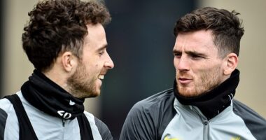 Great pals Diogo Jota and Andy Robertson enjoy a chat during a Liverpool training session back in 2022