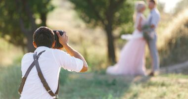 An anonymous wedding photographer revealed a professional and ethical dilemma after capturing a picture of a married groomsman kissing a wedding guest (Picture: stock image)