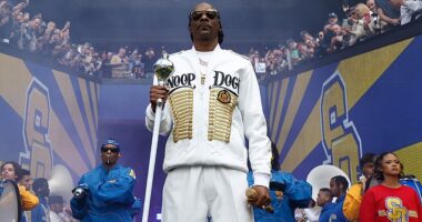 Snoop Dogg, 53, has been hailed as the 'King of Rap' after he took to the stage for the AFL Grand Final on Saturday