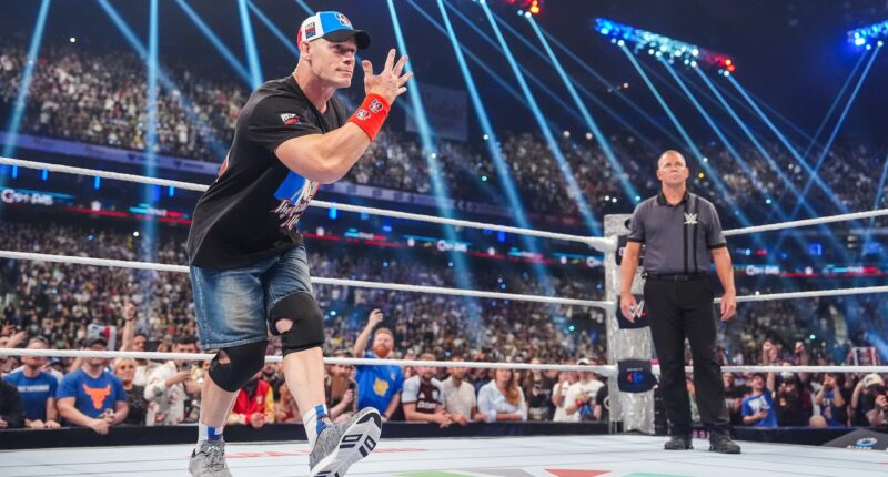 PARIS, FRANCE - AUGUST 31: John Cena makes his entrance during WWE Clash in Paris at Paris Le Defense Arena on August 31, 2025 in Paris, France.