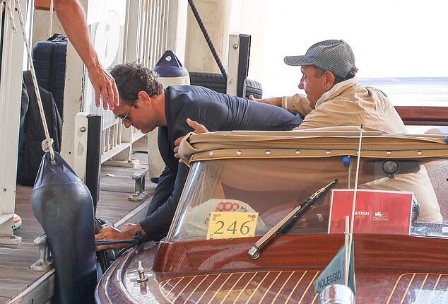 Jude Law was unable to keep his balance on a boat in Venice on Monday as he tumbled over after attending the 82nd Film Festival