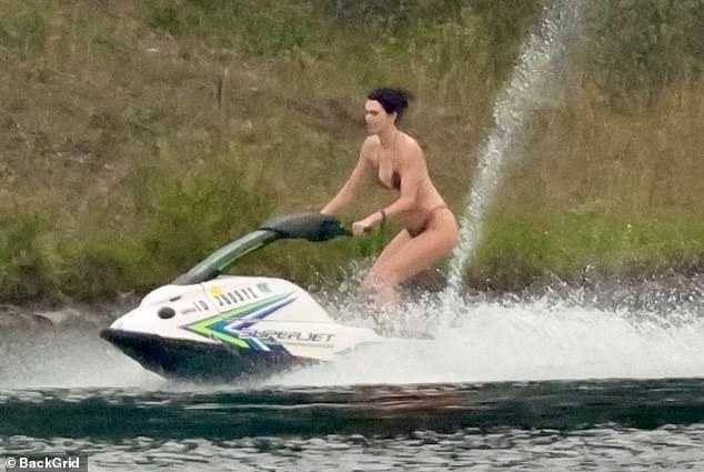 Kendall Jenner flaunted her supermodel figure during a sun-soaked lake getaway in Washington state on Monday