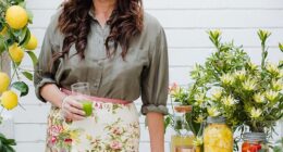 'Research has shown that couples who live together gradually develop remarkably similar gut microbiomes,' Lee Holmes (pictured), an Australian clinical nutritionist, says