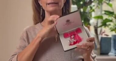 Livia Firth with her MBE, which she was awarded in 2019 for her campaigning work for garment workers