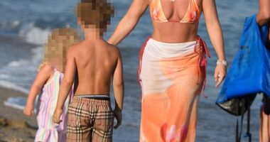 Lauryn Goodman showed off her toned figure during a fun-filled family holiday with her two children in Marbella on Tuesday