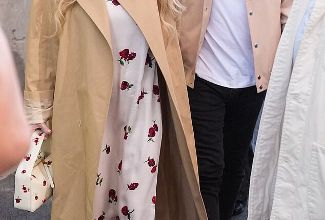 Lindsay Lohan, 39, couldn't stop smiling as she attended the US Open on Sunday with husband Bader Shammas