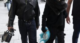 Madonna enjoyed a romantic stroll with her toyboy lover Akeem Morris as the pair jetted off to Paris on Monday