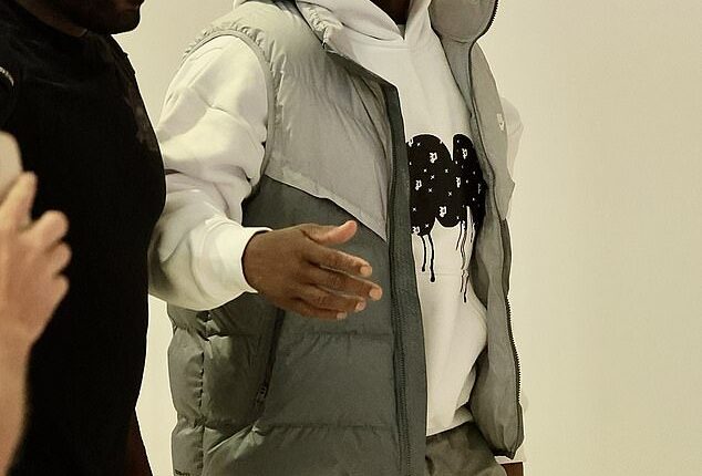 US hip-hop legend 50 Cent was all smiles on Saturday as he jetted out of Sydney