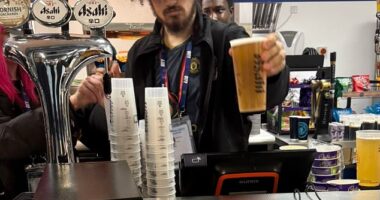 A bar worker at the Etihad Stadium has been sacked after turning up for his shift wearing a Manchester United shirt on derby day