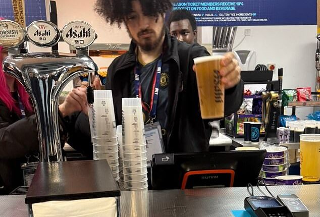 A bar worker at the Etihad Stadium has been sacked after turning up for his shift wearing a Manchester United shirt on derby day