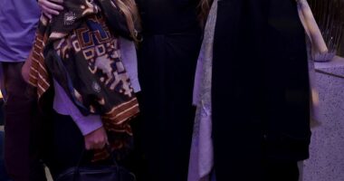 Mary-Kate (left) and Ashley Olsen (right) attended a party thrown Thursday by W Magazine and Bloomingdale's, and posed with the magazine's editor-in-chief Sara Moonves (center)