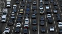 Americans have been warned to stay off the roads to protect their health and avoid thunderstorms during one of the busiest travel days in years