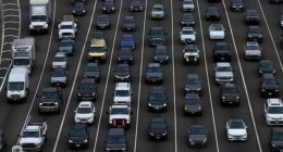 Americans have been warned to stay off the roads to protect their health and avoid thunderstorms during one of the busiest travel days in years