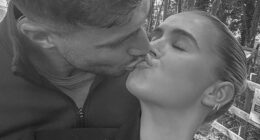 Molly-Mae Hague and Tommy Fury shared a kiss as they posed for loved-up snaps during a family day out on Monday