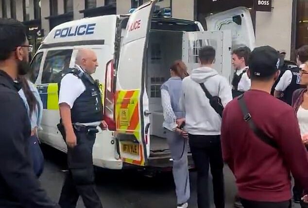 Moment Bulgarian pickpocket gang are arrested outside Selfridges after stealing shopper's £1k designer purse