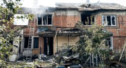 A Ukrainian mother who was pregnant with twins has died after her village was struck by an overnight Russian drone attack. Her two small sons, aged four and six, and her husband were also killed. Pictured: Remains of building struck by Russian drone attack on September 30, 2025 in Chernechchyna