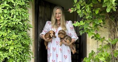 Sasha Wilkins with her dog Lettice (left) at her rented cottage in the Cotswolds