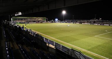 A National League clash between Eastleigh and Scunthorpe was abandoned in stoppage time after a clash of heads