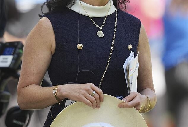 Irsay-Gordon is pictured with her headphones, notepad and flip card during a Week 1 win