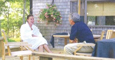 Lord Mandelson - who once infamously declared himself 'intensely relaxed about people getting filthy rich' - in a fluffy white dressing gown enjoying a chat with Jeffrey Epstein