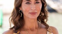 The Devil Wears Prada actress looked stunning in a baby blue Schiaparelli dress with a ruched waist and embellished shoulder straps, with her vibrant hair styled in and old-Hollywood curl