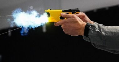 Hundreds of prison officers are to be given Tasers (pictured, file photo) for the first time in order to defend themselves against inmates, ministers announced last night