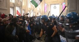 Protesters clash with anti-riot police at Milano Centrale train station on the sidelines of a nationwide strike organized by the Unione Sindacale di Base
