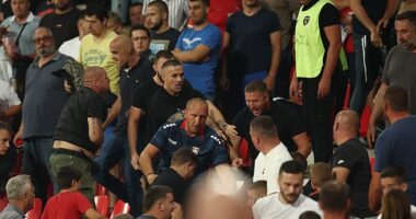 Riot police had to enter the stands after during England's clash with Serbia due to home fans fighting each other