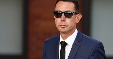 David Coote arrived at court on Thursday morning after being charged with making a 'Category A' video of a child