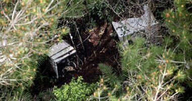 Another possible campsite included three metal containers