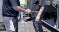 South Korea 's foreign minister may visit the United States to respond to a raid on a Huyndai plant in Georgia that detained 475 people, most of them South Korean nationals, with photos showing some of those arrested being put in chains