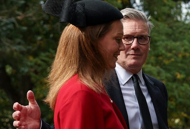 Sir Keir Starmer and his wife Victoria pictured arriving today for a church service at Crathie Kirk, near Balmoral, Scotland