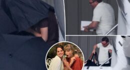 Taylor Swift hides under umbrellas as she lands in Calfiornia for Selena Gomez's wedding