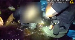 An unidentified woman frantically called Florida sheriff's deputies to report that she and her husband were trapped in a vehicle sinking into a canal Friday night