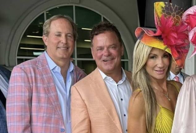 With her then-husband Troy Duhon standing between them, Tracy Duhon (right) and Texas Attorney General Ken Paxton (left) pose for a photo at the Kentucky Derby in May 2024